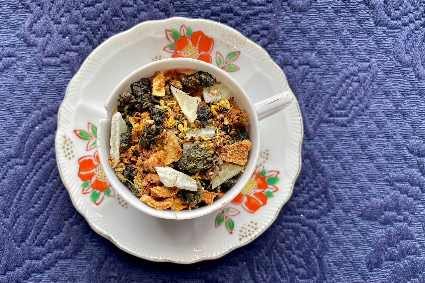 Teacup full of leaf and fruit