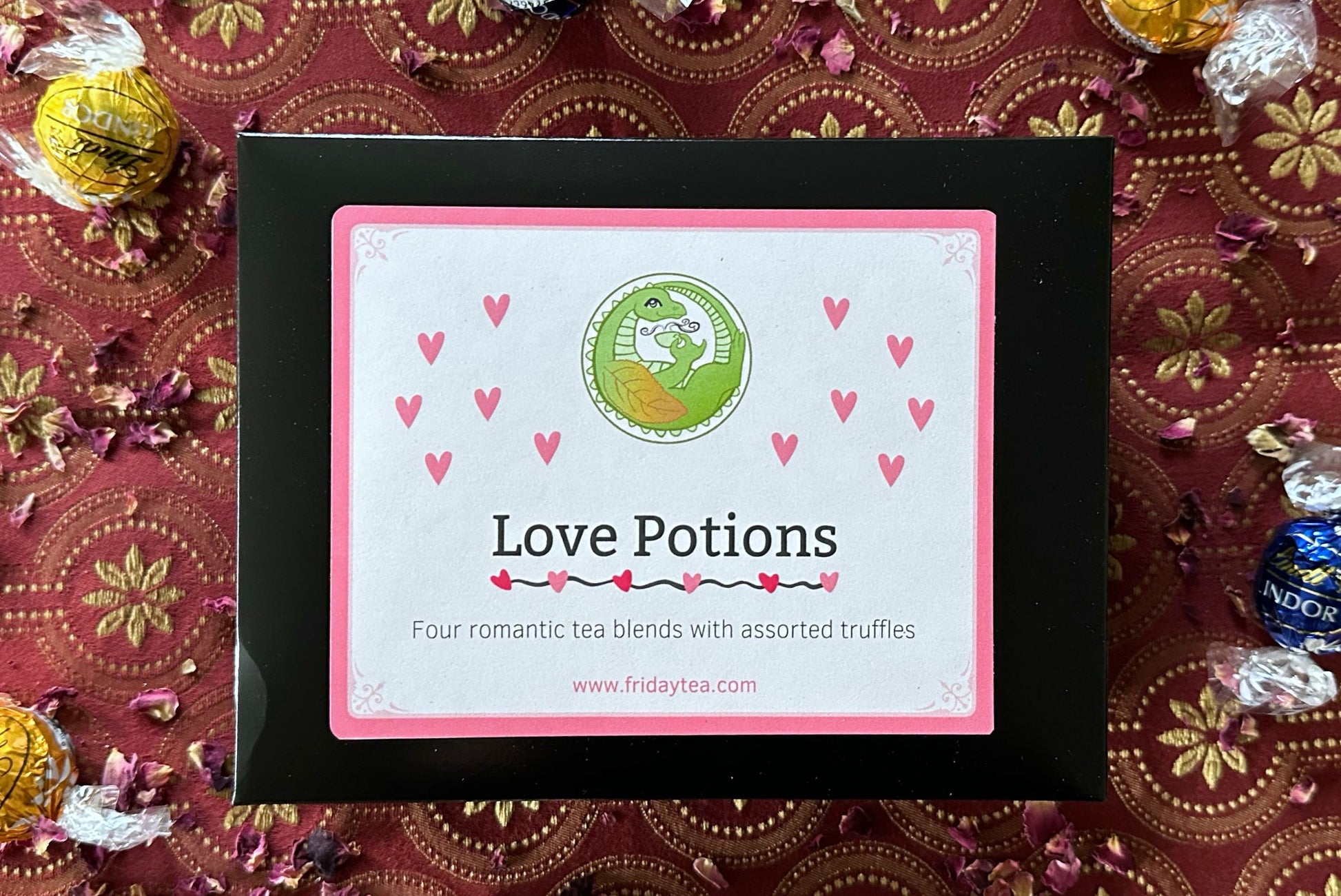 Box of 'Love Potions' tea with decorative background
