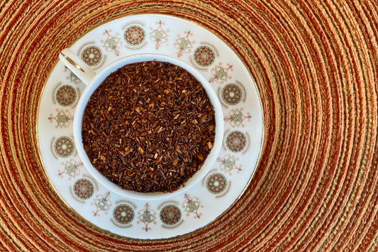 teacup full of red rooibos leaf