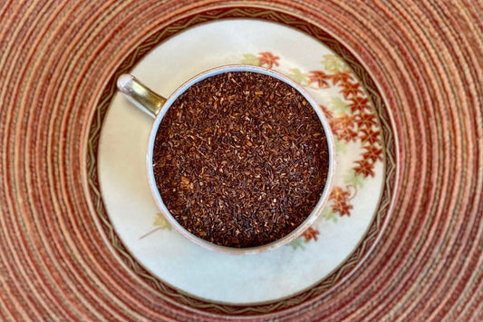 teacup full of red rooibos leaf