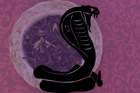 tea leaves in cup with cobra silhouette overlay