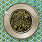 teacup full of tea and mint leaves